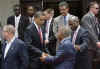 President Barack Obama says good bye to PM Manning and his fellow heads of state at the group photo session at the conclusion of the 5th Summit of the Americas.