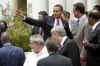 President Barack Obama says good bye to his fellow heads of state at the group photo session at the conclusion of the 5th Summit of the Americas.