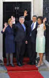 President Barack Obama and First Lady Michelle Obama are greeted by UK PM Gordon Brown and his wife Sarah at 10 Downing Street.