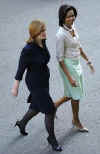 First Lady Michelle Obama and Sarah Brown leave 10 Downing Street to visit a cancer center in West London.