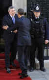 President Barack Obama and First Lady Michelle Obama are greeted by UK PM Gordon Brown and his wife Sarah at 10 Downing Street.