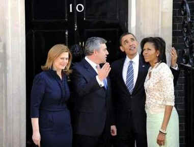 President Barack Obama and First Lady Michelle Obama are greeted by UK PM Gordon Brown and his wife Sarah at 10 Downing Street.