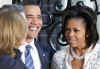 President Barack Obama and First Lady Michelle Obama are greeted by UK PM Gordon Brown and his wife Sarah at 10 Downing Street.