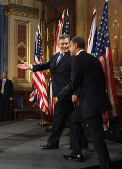 President Barack Obama and UK PM Gordon Brown on their way to a joint news conference in the Foreign and Commonwealth Office building in London.