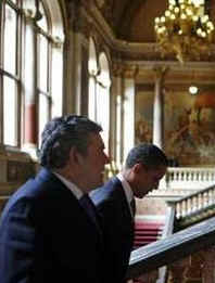 President Barack Obama and UK PM Gordon Brown on their way to a joint news conference in the Foreign and Commonwealth Office building in London.