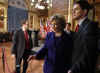 Secretary of State Hillary Clinton and UK Foreign Minister Miliband arrive to a joint news conference in the Foreign and Commonwealth Office building in London.