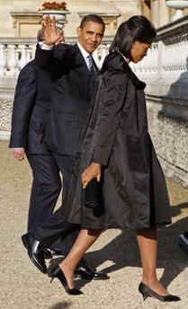 President Barack Obama and First Lady Michelle Obama arrive to visit Queen Elizabeth II and Prince Phillip the Duke of Edinburgh at Buckingham Palace in London.