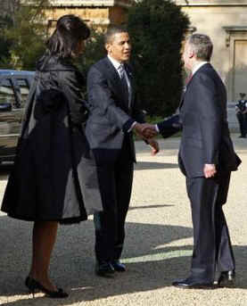 President Barack Obama and First Lady Michelle Obama arrive to visit Queen Elizabeth II and Prince Phillip the Duke of Edinburgh at Buckingham Palace in London.