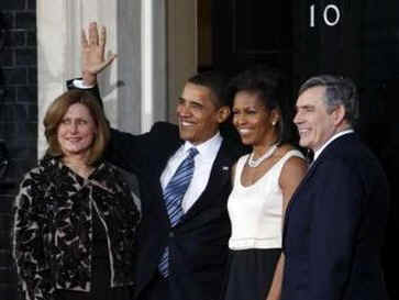 President Barack Obama and First Lady Michelle Obama arrive at 10 Downing Street where their day started earlier.