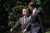 President Barack Obama walks King Abdullah II of Jordan to his limousine after meetings in the White House.