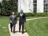 President Barack Obama walks King Abdullah II of Jordan to his limousine after meetings in the White House.