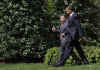 President Barack Obama walks King Abdullah II of Jordan to his limousine after meetings in the White House.