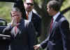 President Barack Obama walks King Abdullah II of Jordan to his limousine after meetings in the White House.