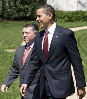 President Barack Obama walks King Abdullah II of Jordan to his limousine after meetings in the White House.