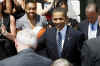 President Barack Obama arrives at a ceremony honoring the NCAA Division 1 Basketball Champions from the University of Connecticut in front of the South Portico of the White House on April 27, 2009.