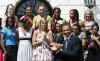 President Barack Obama applauds at a ceremony honoring the NCAA Division 1 Basketball Champions from the University of Connecticut in front of the South Portico of the White House on April 27, 2009.