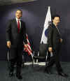 President Barack Obama meets with South Korean President Lee Myung-bak at the Excel Centre in London.