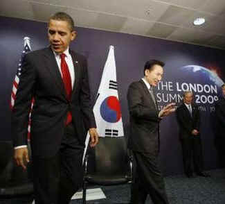 President Barack Obama meets with South Korean President Lee Myung-bak at the Excel Centre in London.