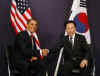 President Barack Obama meets with South Korean President Lee Myung-bak at the Excel Centre in London.