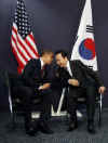 President Barack Obama meets with South Korean President Lee Myung-bak at the Excel Centre in London.