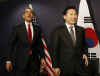 President Barack Obama meets with South Korean President Lee Myung-bak at the Excel Centre in London.