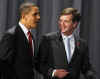 President Obama meets Dutch PM Peter Balkenende during the G20 group photo in London.