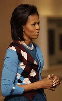 First Lady Michelle Obama joins Sarah Brown, the wife of UK PM Brown, and other spouses of G20 leaders at a special performance of Giselle at the Royal Opera House in London on April 2, 2009.