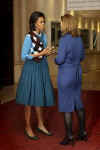 First Lady Michelle Obama joins Sarah Brown, the wife of UK PM Brown, and other spouses of G20 leaders at a special performance of Giselle at the Royal Opera House in London on April 2, 2009.