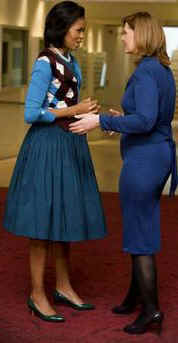 First Lady Michelle Obama joins Sarah Brown, the wife of UK PM Brown, and other spouses of G20 leaders at a special performance of Giselle at the Royal Opera House in London on April 2, 2009.