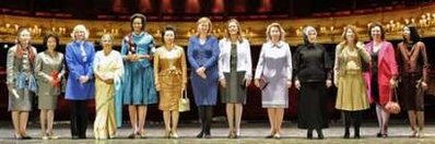 First Lady Michelle Obama joins Sarah Brown, the wife of UK PM Brown, and other spouses of G20 leaders at a special performance of Giselle at the Royal Opera House in London on April 2, 2009.