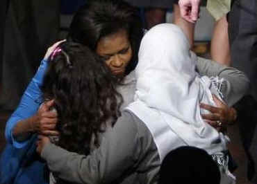 First Lady Michelle Obama visits students at the Elizabeth Garrett Anderson Language School in London on April 2, 2009.