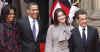 US President Barack Obama and First Lady Michelle Obama pose with French President Sarkozy and French First Lady Carla Bruni-Sarkozy on the steps of the Palais Rohan.