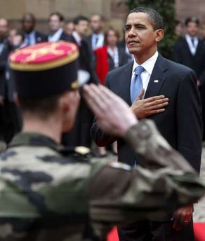 A French military band played the French and American national anthems at the ceremony in the Palais Rohan.