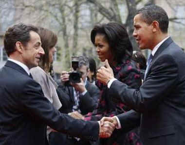 President Barack Obama and First Lady Michelle Obama are greeted by French President Sarkozy and his wife Carla Bruni-Sarkozy at the Palais Rohan in Strasbourg, France.