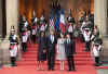 US President Barack Obama and First Lady Michelle Obama pose with French President Sarkozy and French First Lady Carla Bruni-Sarkozy on the steps of the Palais Rohan.