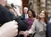 President Barack Obama and First Lady Michelle Obama say goodbye to the waiting crowds and President Sarkozy.