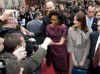 President Barack Obama and First Lady Michelle Obama say goodbye to the waiting crowds and President Sarkozy.