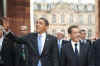 President Barack Obama and First Lady Michelle Obama say goodbye to the waiting crowds and President Sarkozy.