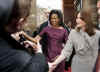 President Barack Obama and First Lady Michelle Obama say goodbye to the waiting crowds and President Sarkozy.