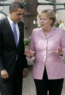 President Obama and Chancellor Merkel talked as they strolled through the market on their way to a welcoming ceremony.