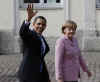 President Obama and Chancellor Merkel talked as they strolled through the market on their way to a welcoming ceremony.