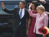 President Barack Obama and First Lady Michelle Obama are cheered by the crowd, and welcomed by German Chancellor Angela Merkel and her husband Joachim Sauer in the market at Baden-Baden, Germany on April 3, 2009.