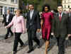 President Obama and Chancellor Merkel talked as they strolled through the market on their way to a welcoming ceremony.