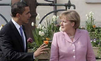 President Obama and Chancellor Merkel talked as they strolled through the market on their way to a welcoming ceremony.