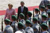 President Barack Obama joins German Chancellor Angela Merkel to inspect a German Military Honour Guard.