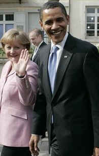 President Obama and Chancellor Merkel talked as they strolled through the market on their way to a welcoming ceremony.