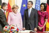 President Obama and First Lady Michelle Obama sign the Baden-Baden Golden Book at the Rathaus (City Hall).