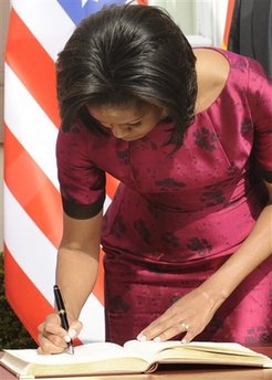 President Obama and First Lady Michelle Obama sign the Baden-Baden Golden Book at the Rathaus (City Hall).