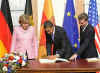 President Obama and First Lady Michelle Obama sign the Baden-Baden Golden Book at the Rathaus (City Hall).