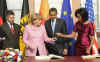 President Obama and First Lady Michelle Obama sign the Baden-Baden Golden Book at the Rathaus (City Hall).